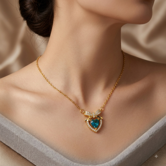 Gold Crystal Bow & Teal Heart Pendant Necklace